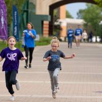 Excited children nearing finish line